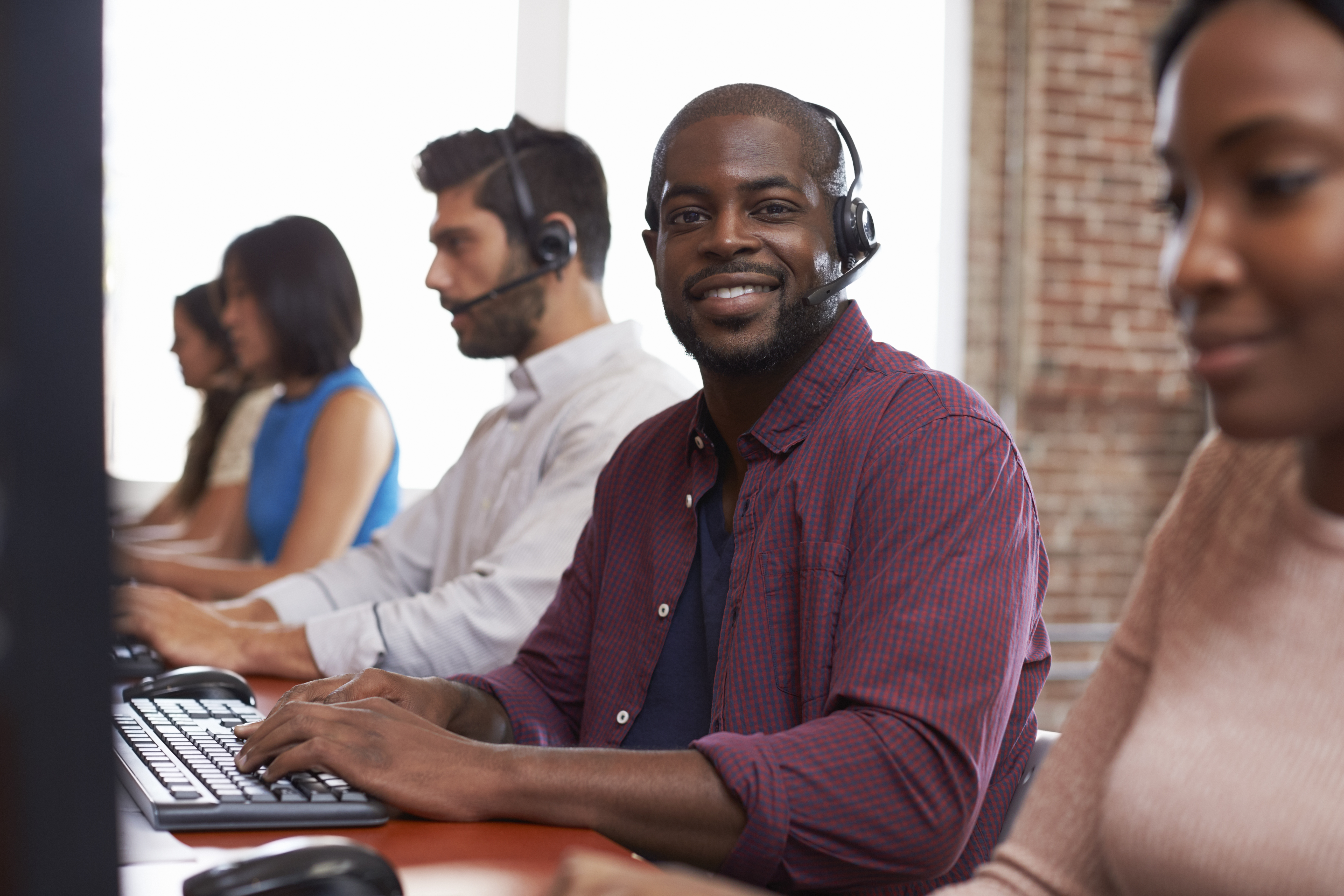 Staff In Busy Call Center