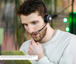 2 Crisis Connections volunteer on a call